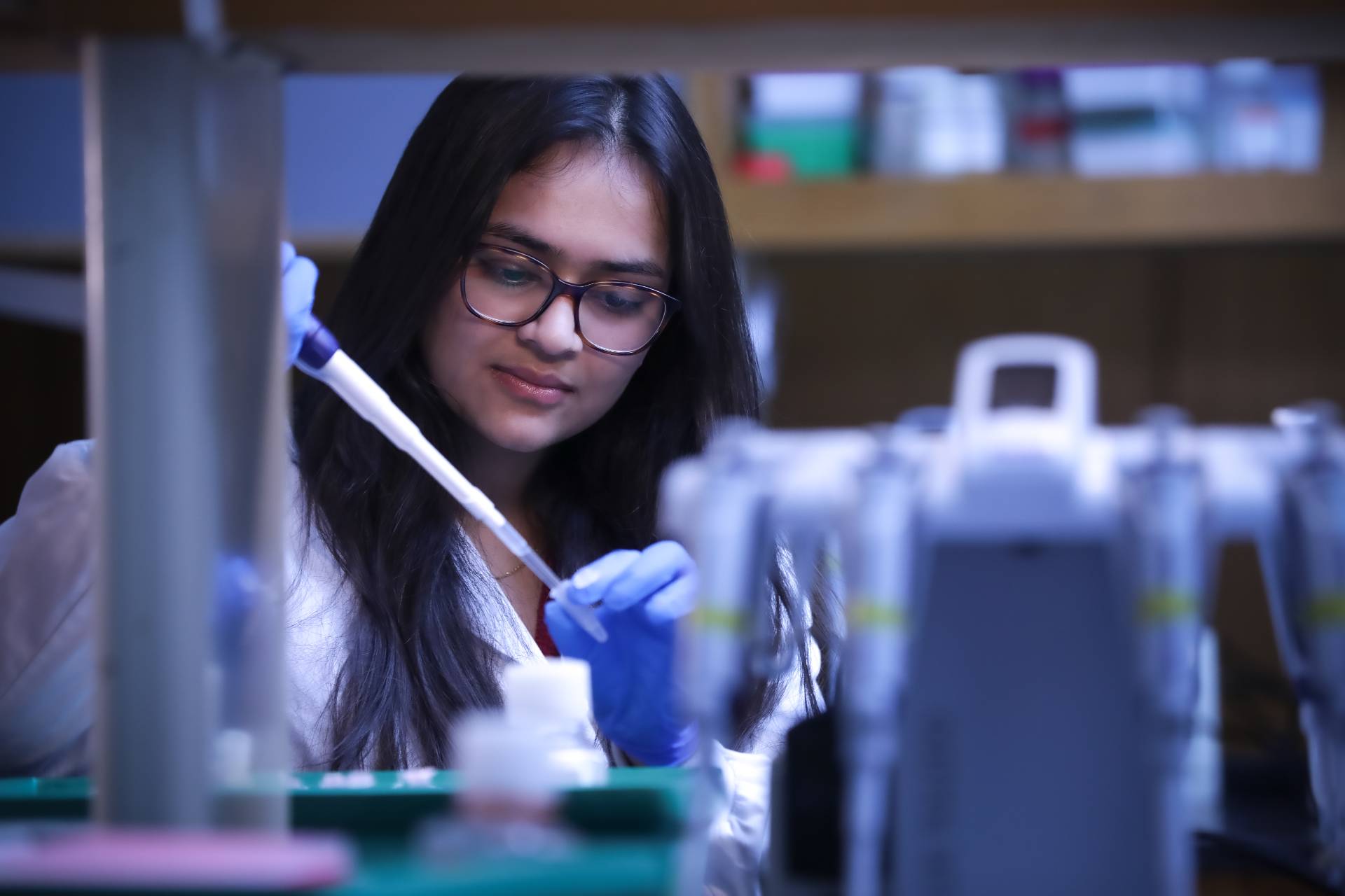 Photo of a College of Science and Engineering student in a lab