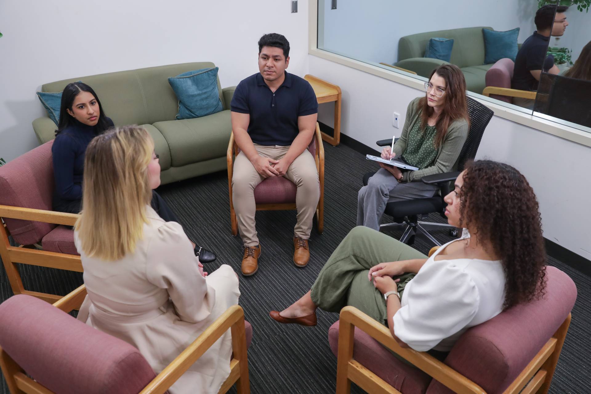 Photo of a group of College of Human Sciences and Humanities students collaborating