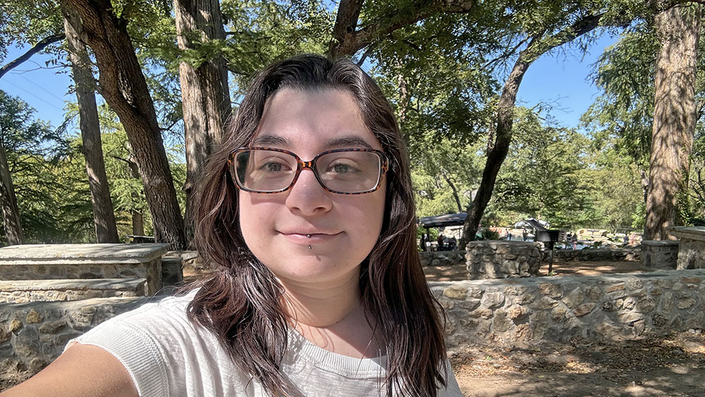 Shae Bejaran A person taking a selfie in an outdoor setting
