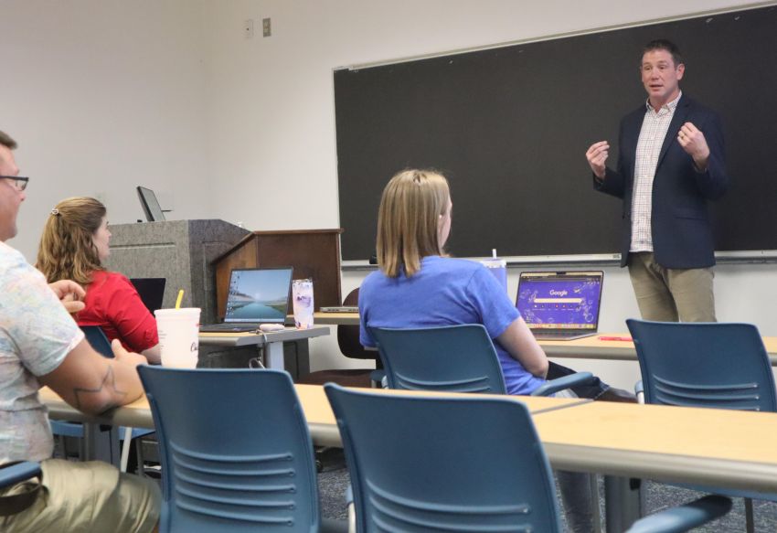 Photo of Dr. Skylar Rolf teaching class