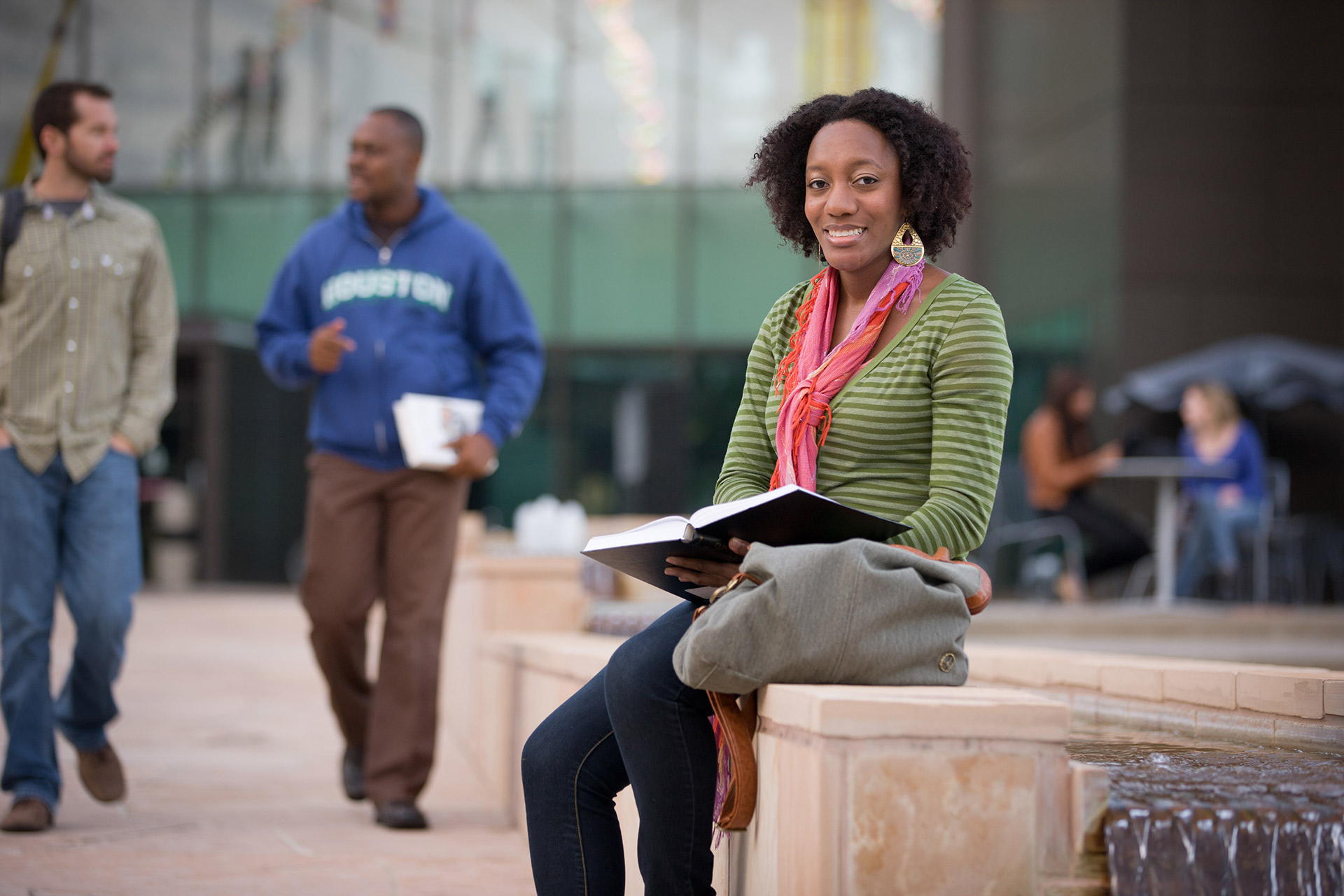 Image of student on campus sitting outside
