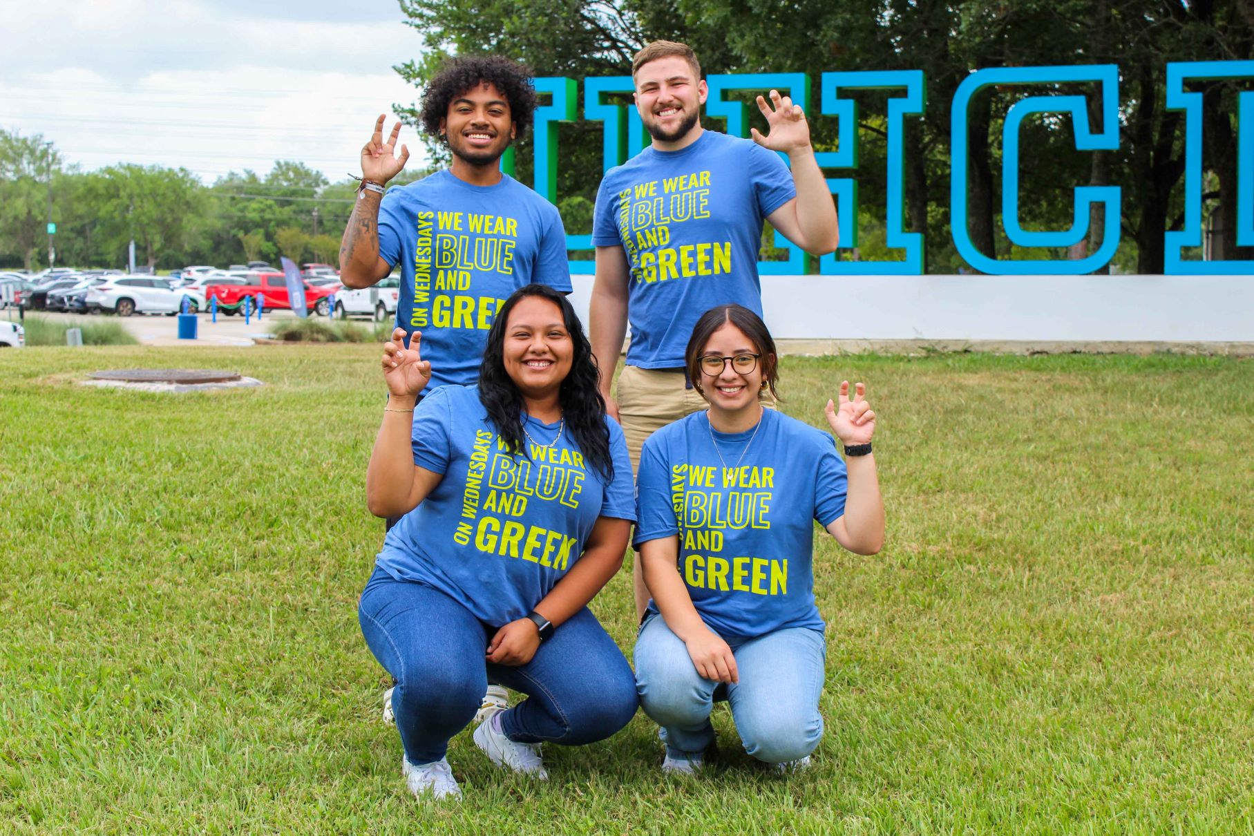 HSTC Officers HSTC Student Leaders holding up handsign